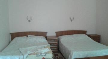 Фото номера Апартаменты с 2 спальнями Гостиница Olimpiyskiye Apartments г. Светлогорск 8