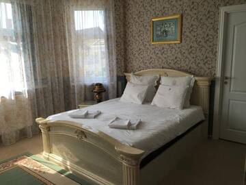 Фото номера Улучшенный двухместный номер с 1 кроватью Гостиница Guest House Grench г. Светлогорск 3